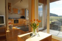 021_Ferienwohnung_Holzhaus_OG_1_560.jpg
